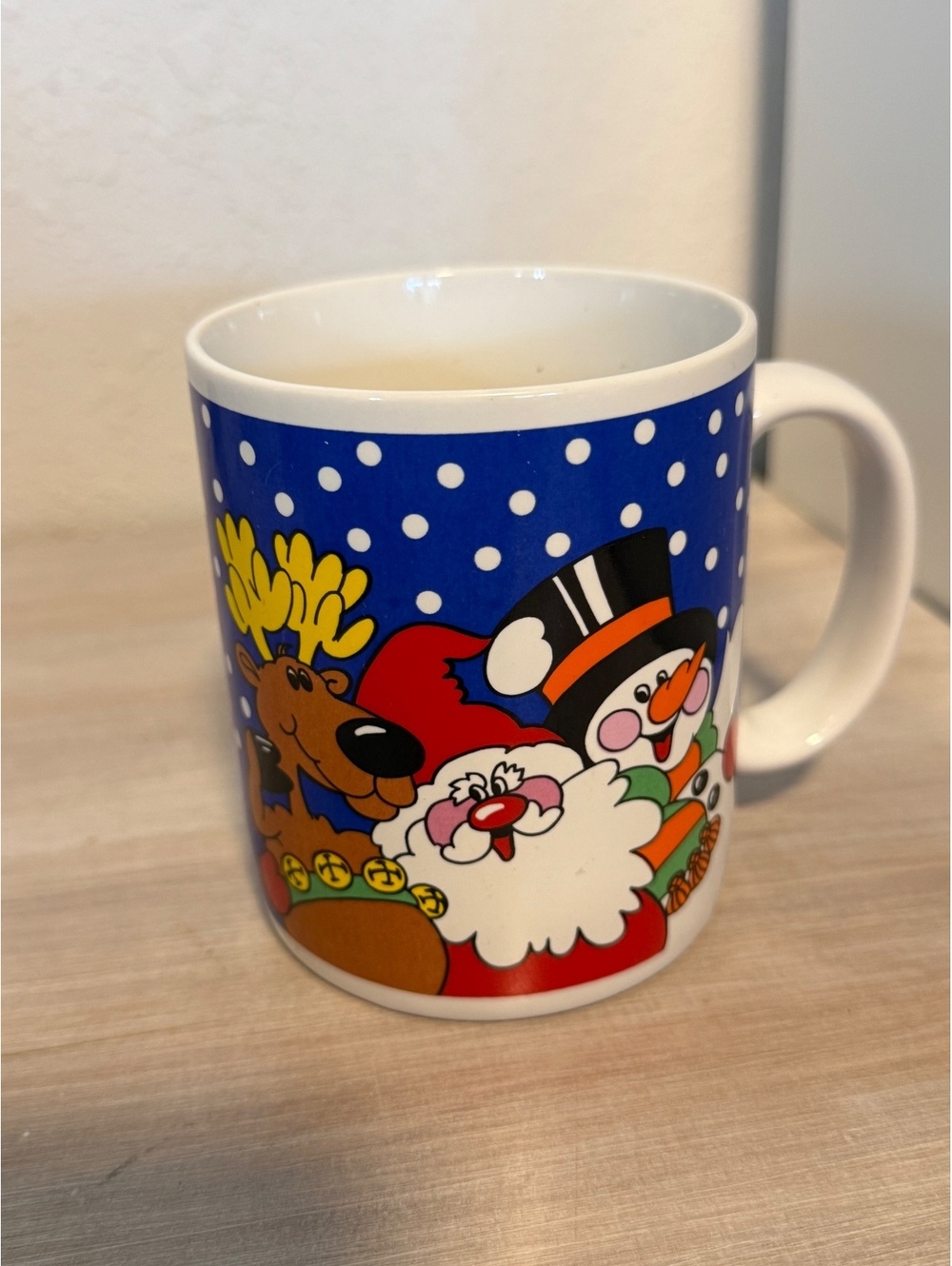 Christmas Holiday Ceramic Coffee Mug with Santa, Snowman, and Reindeer Design